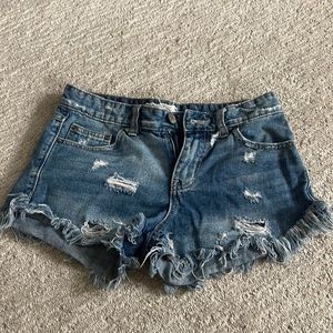 Free People distressed denim shorts